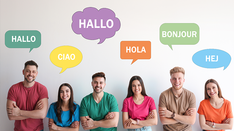 students with speech bubbles that hello in different languages