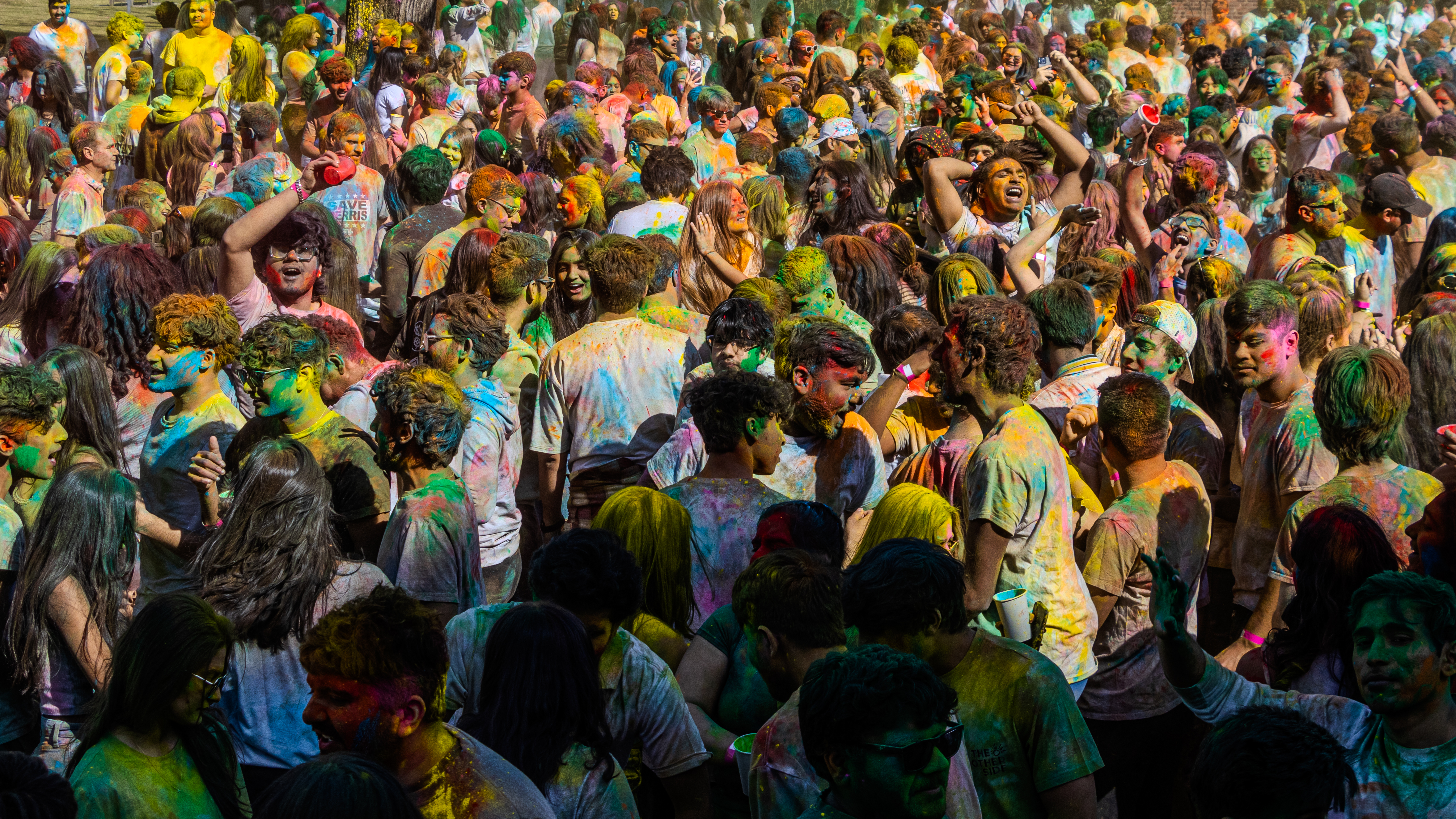 A huge crowd, covered in colors, takes over BU Beach for Dawali