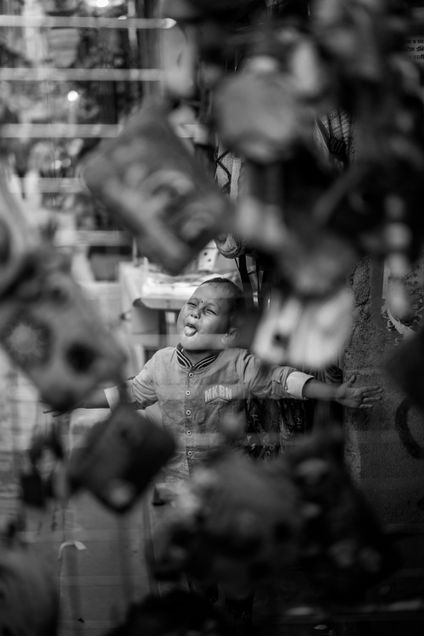 2020 GP Photo Contest Finalist boy catching rain on his tongue in Nepal