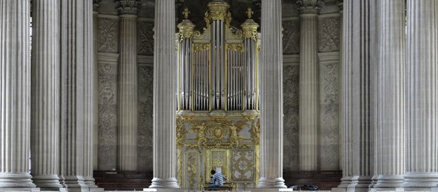 2015 GP Photo Contest Finalist person sitting at an elaborate pipe organ