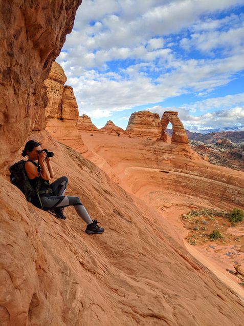 2020 GP Photo Contest Finalist moman taking a photograph in Arches National Park