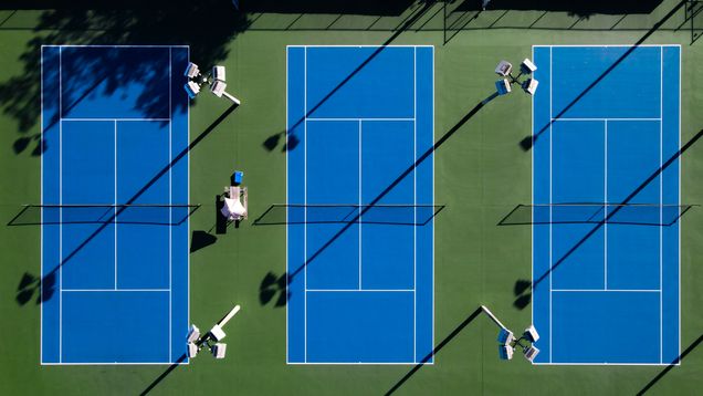 2021 GP photo contest finalist birdseye view of 3 blue tennis courts