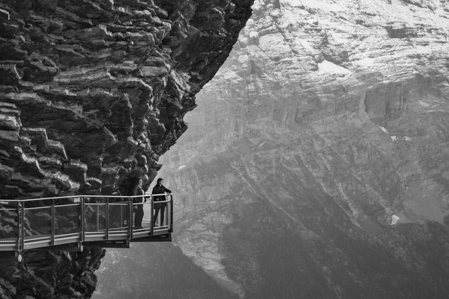 2020 GP Photo Contest Finalist dramatic image of woman on a walkway around a cliff in Grindelwald Switzerland