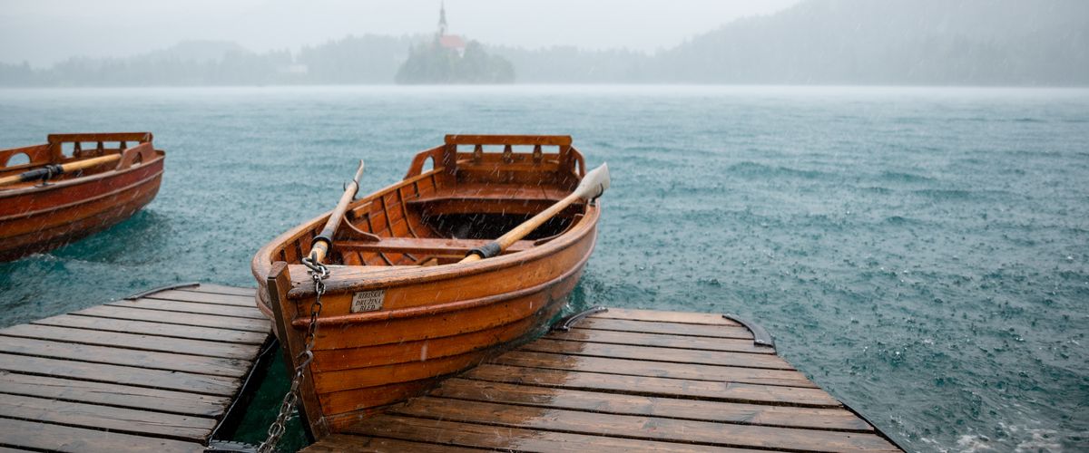 Finalist 2023 GP Photo Contest row boat at a dock in the rain