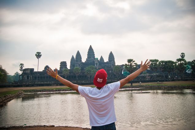 2013 GP Photo Contest Finalist Student with a BU cap facing a temple