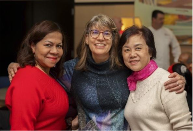 Gina Giamei (center), Senior Lecturer at CELOP, with students from the English for the Workplace program