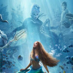 Photo: Movie poster for The Little Mermaid. Ariel with red long braids is looking up with a composite of Ursala behind her in the sea. Her father is to the left and Prince Eric is to the right.