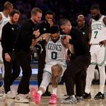 Photo: Jayson Tatum of the Boston Celtics is assisted off the court after an injury at Madison Square Garden