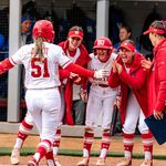 Kylie Doherty (CAS’27) is greeted by her teammates at home plate after hitting a home run against Kentucky at BU Softball Field, April 11. The Terriers own the most potent offense in the conference, which will be key in this weekend’s tournament. Photo by Nate Adams/BU Athletics