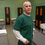 Photo: An older male inmate with white hair pictured inside of a Massachusetts jail