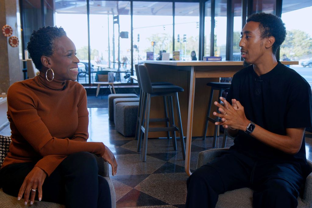 Photo: Boston University President Melissa Gilliam (left) and first-year student Angel Wiley sitting and talking
