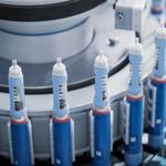 Photo: Stock image of GLP-1 medical injectors in a factory production line