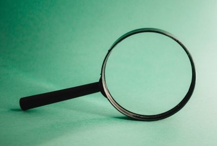 Magnifying glass as research concept