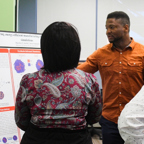 2025 IGS Graduate Student Summer Fellow presenting research at poster session.