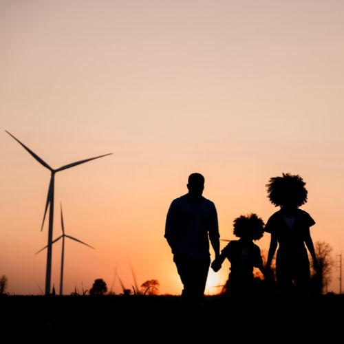 Family in front of windmill