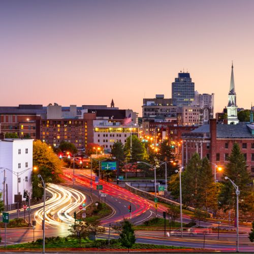An image of cars in Worcester Massachusetts at evening time