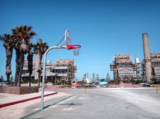Vacant urban basketball court.