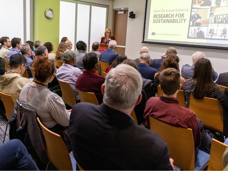 Audience listens to IGS lecture.