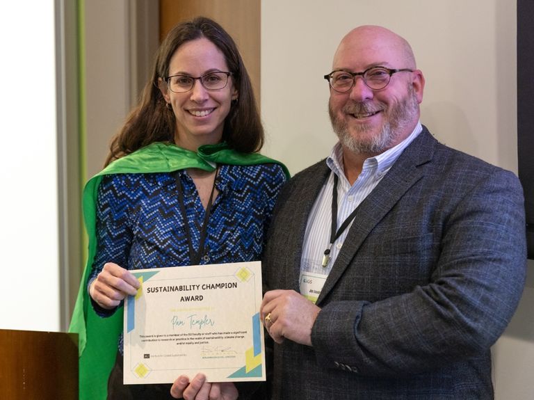 (Pictured left to right): IGS core faculty Pamela Templer (Biology) is presented the 2024 IGS Sustainability Champion Award by IGS advisory board member James Goudreau.