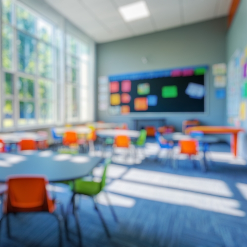 Blurred image of school classroom.