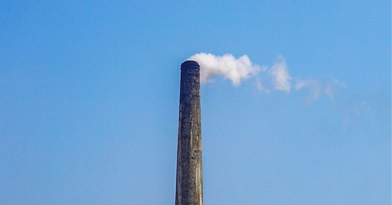 A brick kiln burns smoke