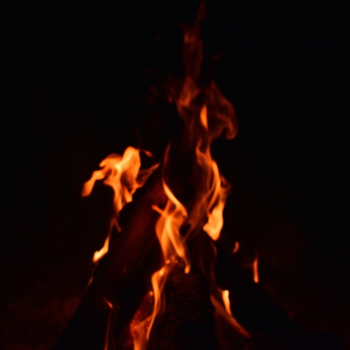 A fire on a dark background.