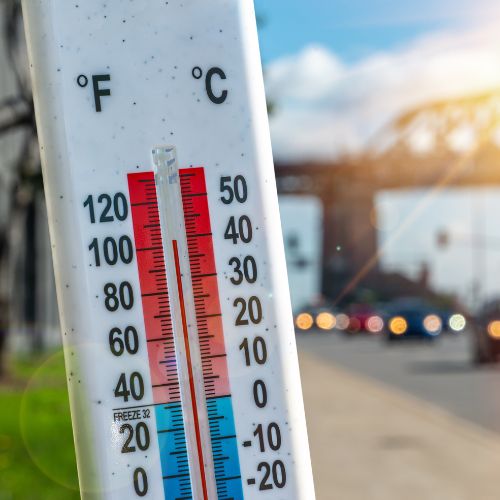 A thermometer shows extreme heat.