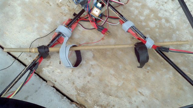 Battery mouting rod, made out of bamboo and held on by velco.