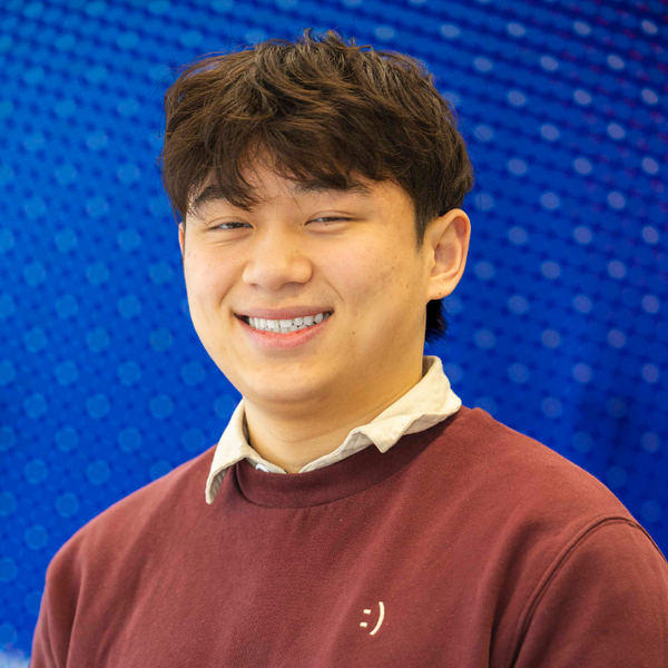 Jonathan smiling for headshot