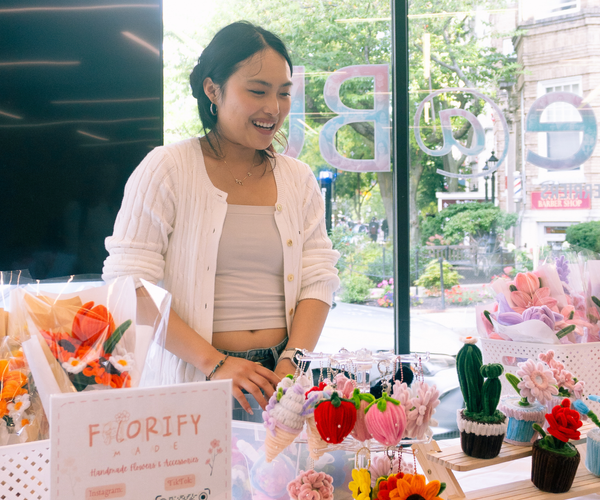 Student-Made Creator "Florify" selling crochet products at Pitch & Pizza Pop-Up
