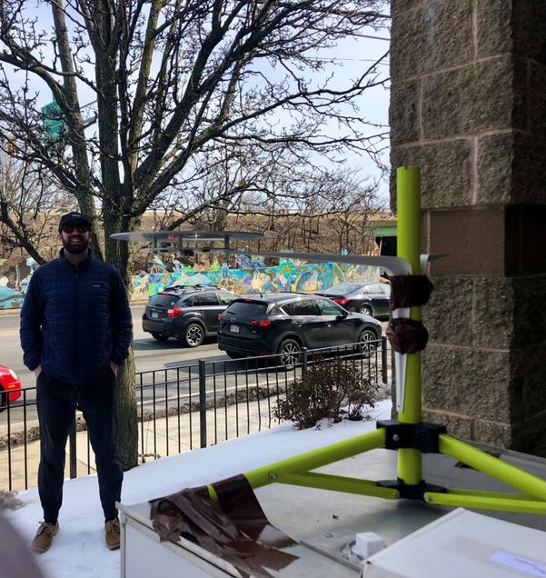 Sean Mueller deploying the experimental ultrafine particle monitor in Somerville, MA adjacent to the heavily trafficked Interstate-93. 