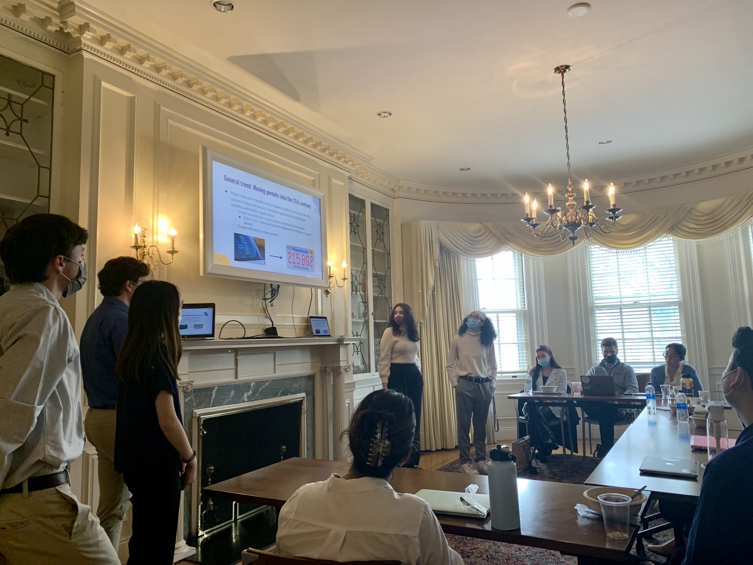 students presenting their work at the IOC