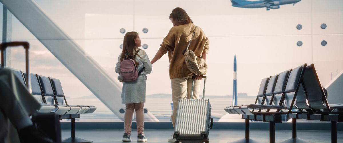 Mother and daughter in airport