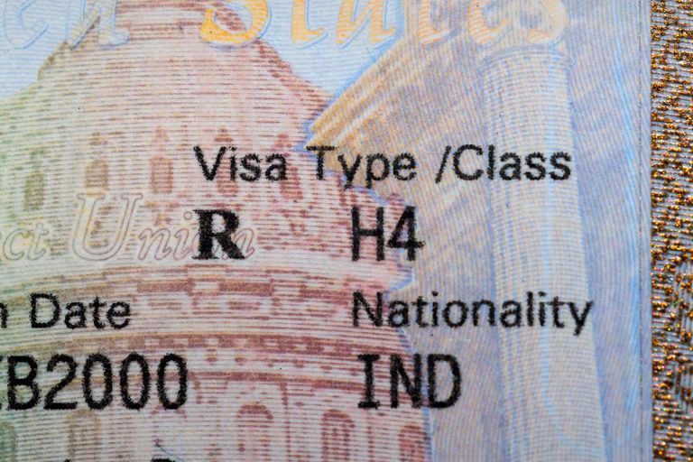 H4 USA visa stamp on Passport page