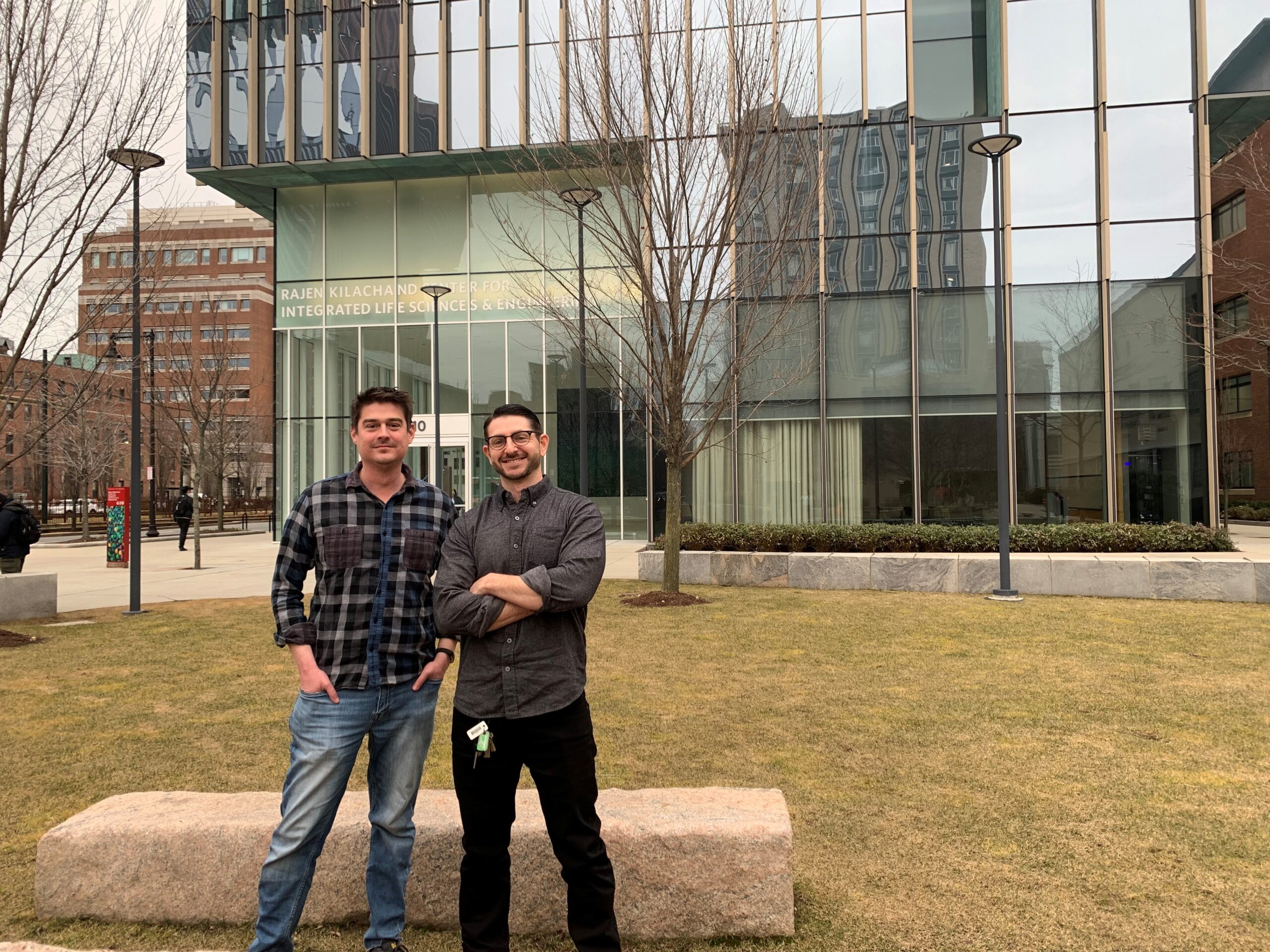 Kevin Gonzales and Daniel Sheehan standing outside front of building