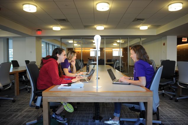 8/29/14 - Boston, Massachusetts Students inside of the new LAW Redstone building. Photo by Tim Llewellyn for Boston University Photography.