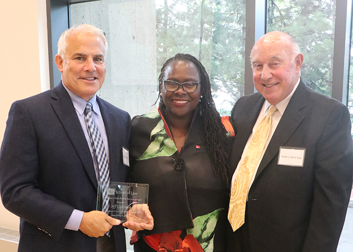 Jeff Goldman, Dean Angela Onwuachi-Willig, and Victor J. Garo (’65)