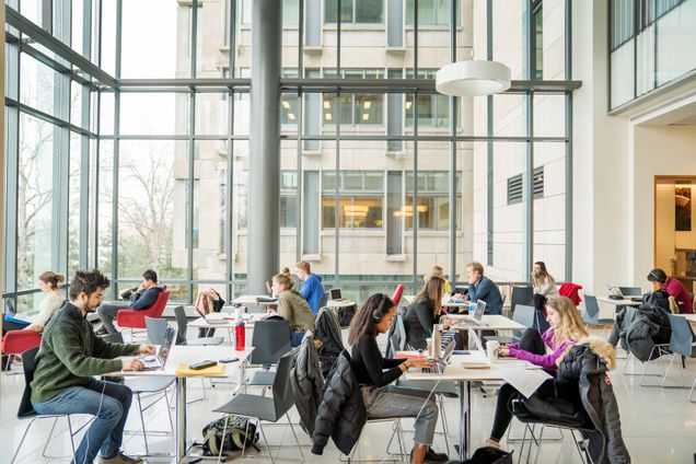 Students studying in the law cafe, McCausland Commons, at BU School of Law