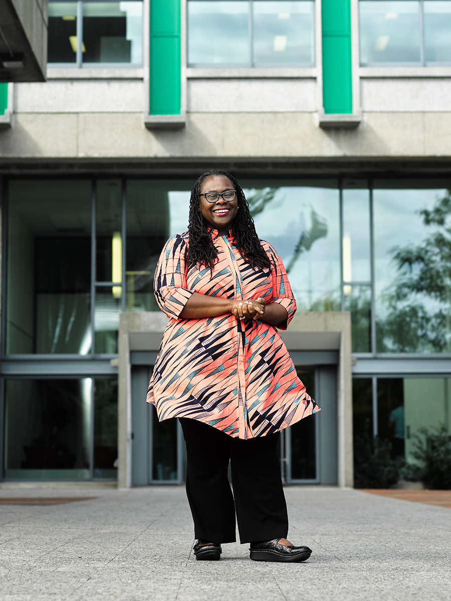 Dean Angela Onwuachi-Willig in front of the BU Law tower