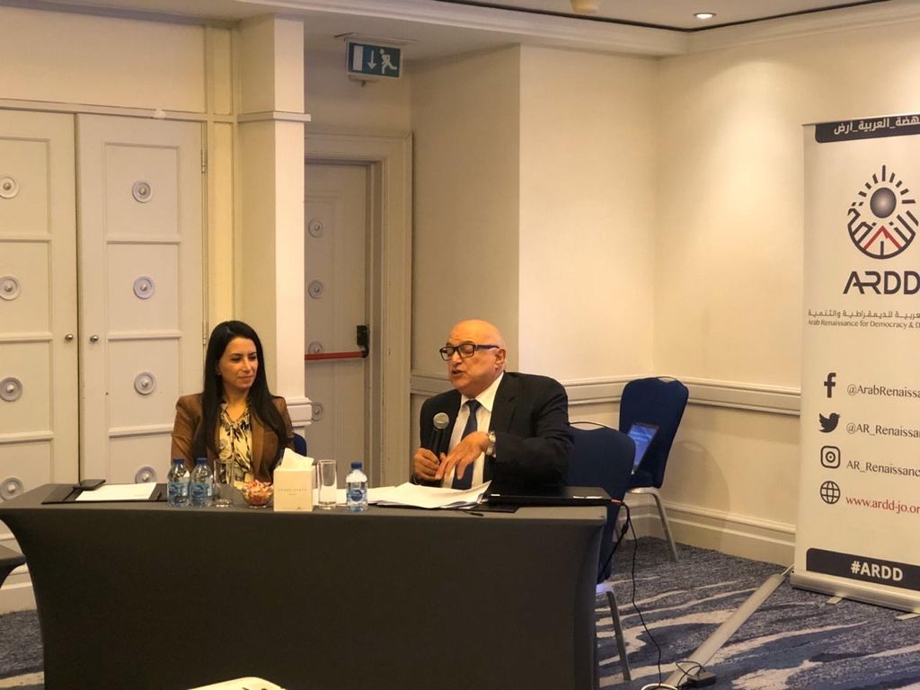 Representatives from AARD and IHRC present at a workshop