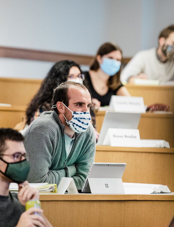 A student in class wearing a mask