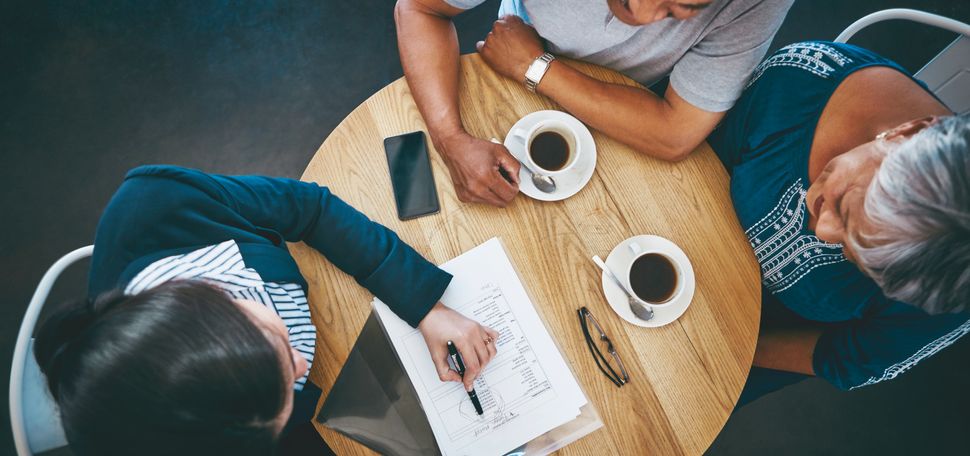 people meeting at a cafe