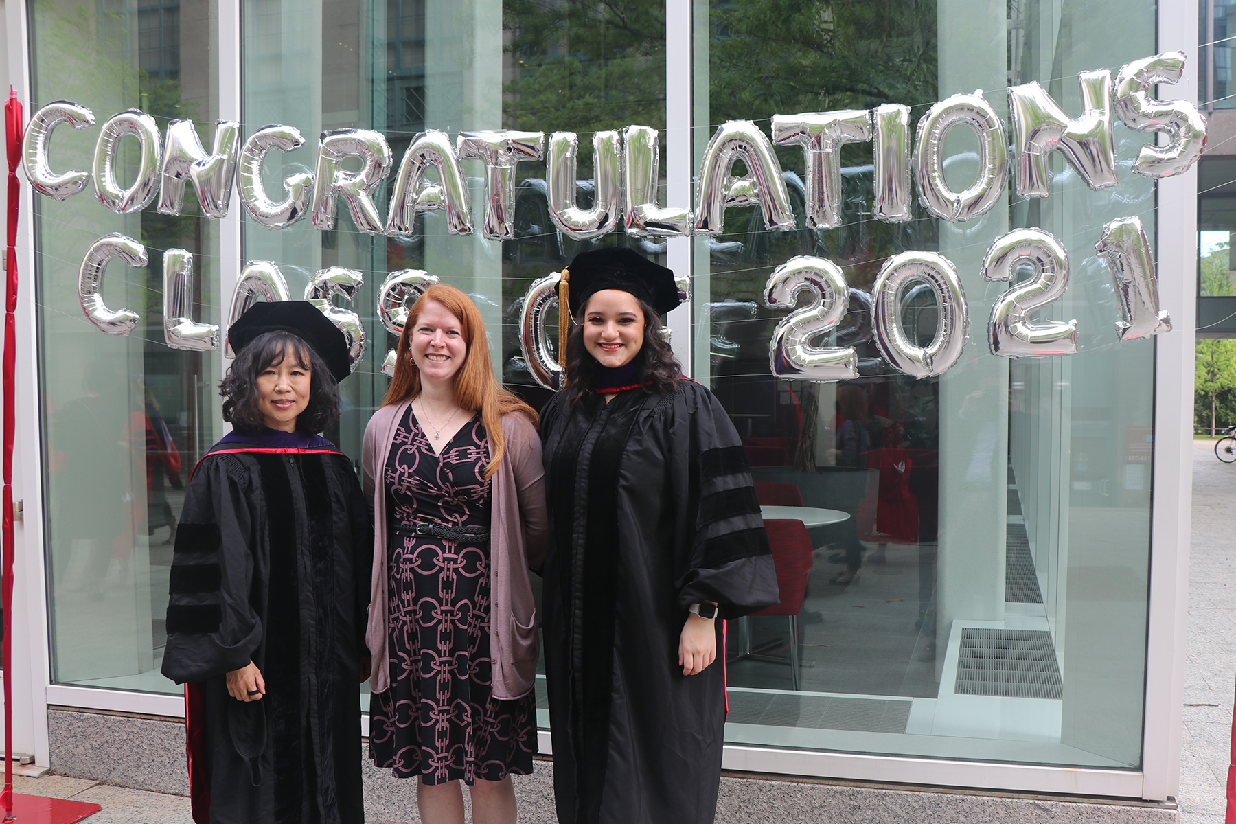 Jenny Hong (MSL'21), Director Christina Rice, and Danielle De Souza (MSL'21) at their graduation celebration