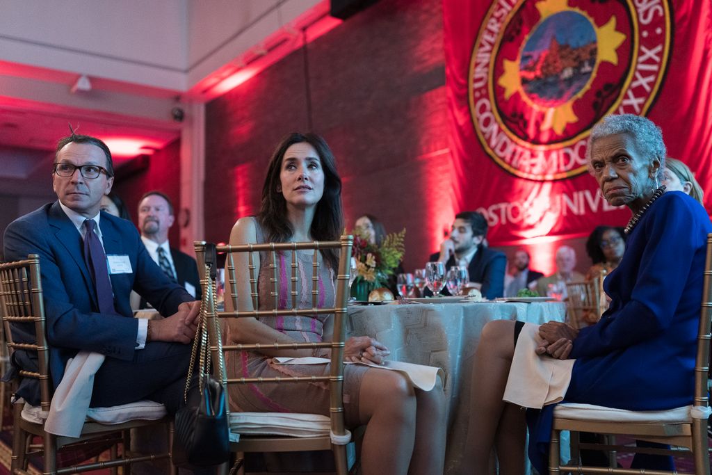 Gala guests including the BU Senior Diversity Officer, Andrea L. Taylor (COM'68) sitting at dining tables while listening to the speakers.