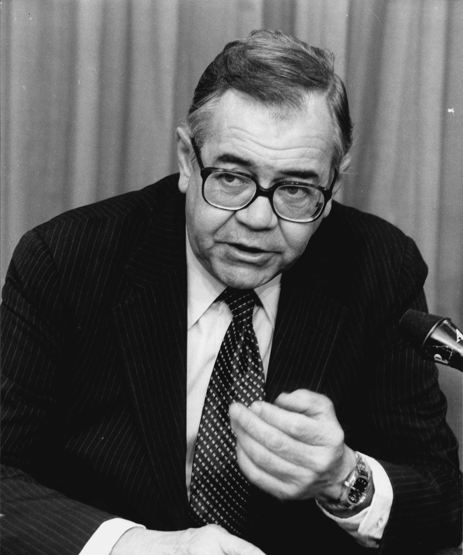 F. Bradford Morse ('49) speaks at a press conference
