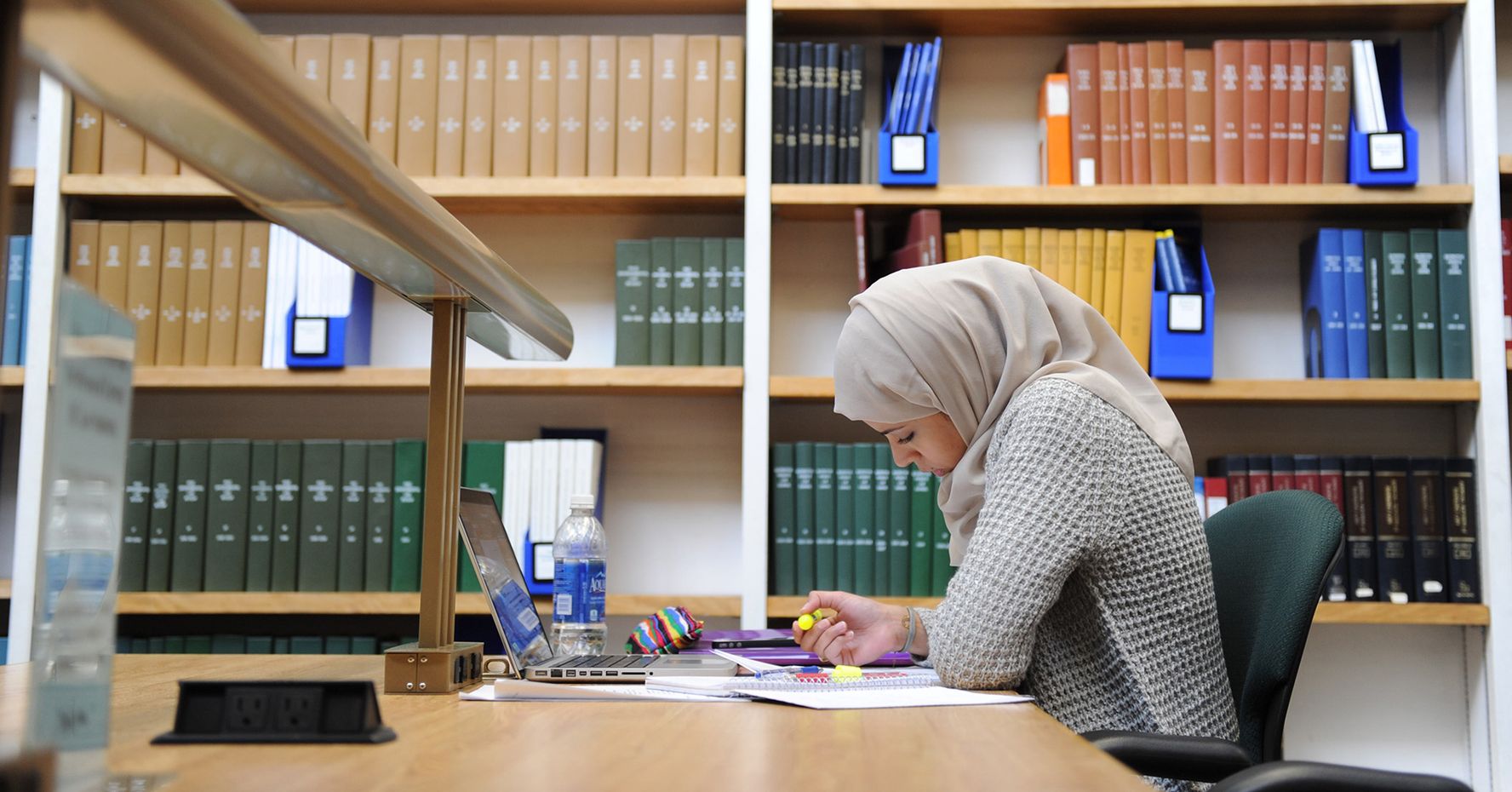 Student studying in library