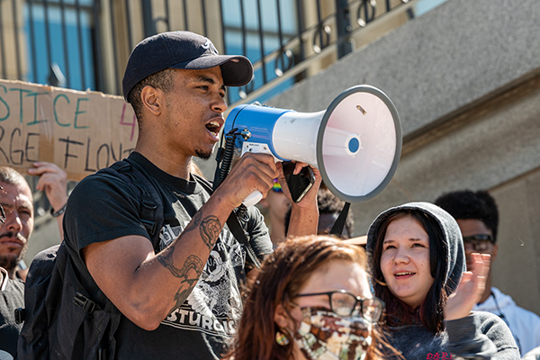 Civil rights and constitutional law at BU Law. Activist speaking at George Floyd's protest.