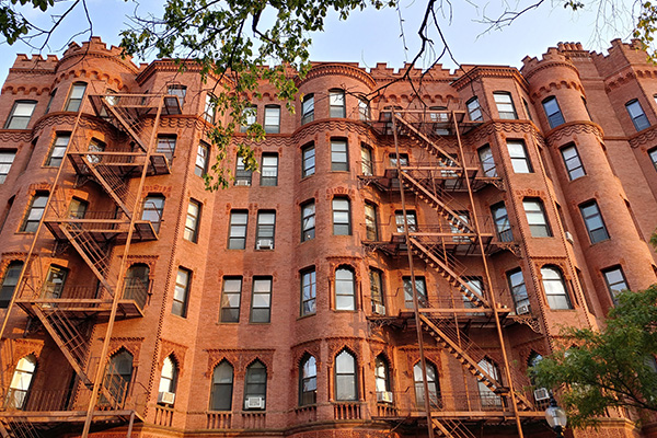 Housing, real estate, and land use at BU Law. Facade of apartment building.