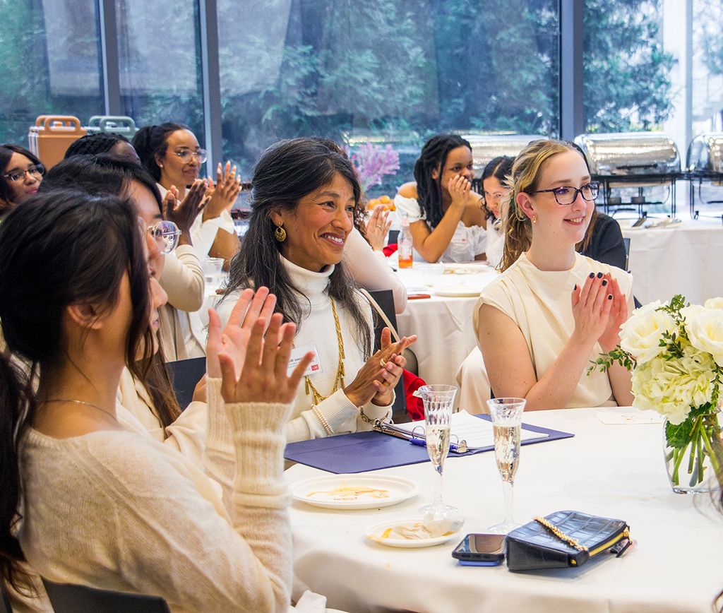 Attendees celebrating at the Women's Law Association gala in 2024