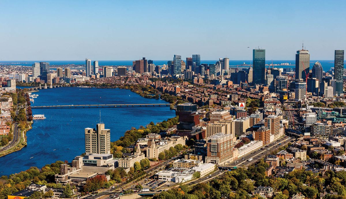 An aerial view of the BU campus and the Boston skyline on a sunny day.